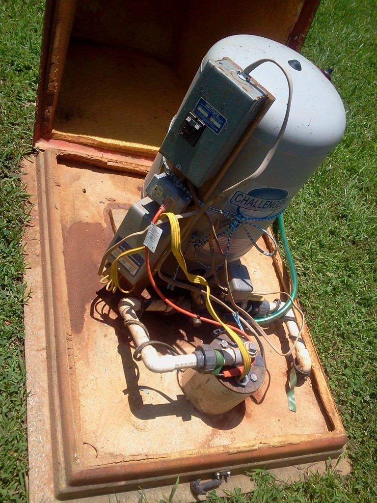 Just look at that wiring!  Oh- and there is no well vent...This 20GPM well has such an undersized pump that it only delivers 6GPM to the home. They can't even water their lawn!